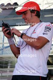 10.05.2007 Barcelona, Spain,  Fernando Alonso (ESP), McLaren Mercedes, with a team branded Kangaroo TV Set - Formula 1 World Championship, Rd 4, Spanish Grand Prix, Thursday