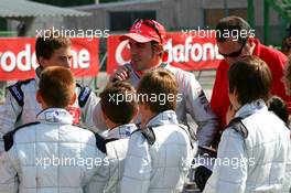 10.05.2007 Barcelona, Spain,  Fernando Alonso (ESP), McLaren Mercedes, talks to the young go-karters - Vodafone Spain Go-Karting Challenge with Fernando Alonso (ESP), McLaren Mercedes - Formula 1 World Championship, Rd 4, Spanish Grand Prix, Thursday