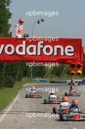 10.05.2007 Barcelona, Spain,  Fernando Alonso (ESP), McLaren Mercedes, watches the track action - Vodafone Spain Go-Karting Challenge with Fernando Alonso (ESP), McLaren Mercedes - Formula 1 World Championship, Rd 4, Spanish Grand Prix, Thursday