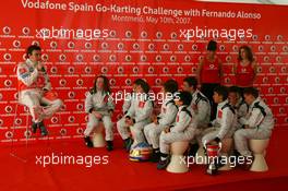 10.05.2007 Barcelona, Spain,  Fernando Alonso (ESP), McLaren Mercedes answers questions from the youngsters - Vodafone Spain Go-Karting Challenge with Fernando Alonso (ESP), McLaren Mercedes - Formula 1 World Championship, Rd 4, Spanish Grand Prix, Thursday