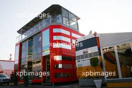 09.05.2007 Barcelona, Spain,  The new Ferrari motorhome which is now 3 stories high which towers over one of the Renault motorhomes  - Formula 1 World Championship, Rd 4, Spanish Grand Prix, Wednesday