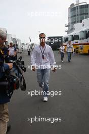 20.07.2007 Nürburg, Germany,  Michael Schumacher (GER), Scuderia Ferrari, Advisor arrives at the track on begin of the first training session - Formula 1 World Championship, Rd 10, European Grand Prix, Friday