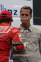 22.07.2007 Nürburg, Germany,  Felipe Massa (BRA), Scuderia Ferrari and Michael Schumacher (GER), Scuderia Ferrari, Advisor - Formula 1 World Championship, Rd 10, European Grand Prix, Sunday Podium