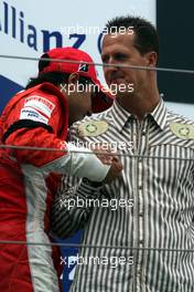 22.07.2007 Nürburg, Germany,  Felipe Massa (BRA), Scuderia Ferrari and Michael Schumacher (GER), Scuderia Ferrari, Advisor - Formula 1 World Championship, Rd 10, European Grand Prix, Sunday Podium