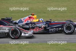 22.07.2007 Nürburg, Germany,  Lewis Hamilton (GBR), McLaren Mercedes and David Coulthard (GBR), Red Bull Racing before the entrance of the pit lane / last corner - Formula 1 World Championship, Rd 10, European Grand Prix, Sunday Race