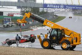 22.07.2007 Nürburg, Germany,  Lewis Hamilton (GBR), McLaren Mercedes, MP4-22 is lifted back onto the circuit - Formula 1 World Championship, Rd 10, European Grand Prix, Sunday Race