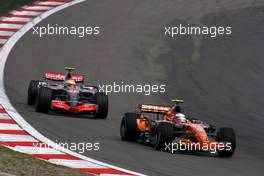 22.07.2007 Nurburg, Germany,  Markus Winkelhock (GER), Spyker F1 Team, Lewis Hamilton (GBR), McLaren Mercedes - Formula 1 World Championship, Rd 10, European Grand Prix, Sunday Race