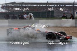 22.07.2007 Nürburg, Germany,  Lewis Hamilton (GBR), McLaren Mercedes, MP4-22, goes thorugh quite a big puddle - Formula 1 World Championship, Rd 10, European Grand Prix, Sunday, Race