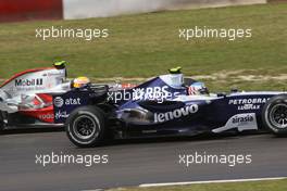 22.07.2007 Nürburg, Germany,  Lewis Hamilton (GBR), McLaren Mercedes and Alexander Wurz (AUT), Williams F1 Team - Formula 1 World Championship, Rd 10, European Grand Prix, Sunday Race