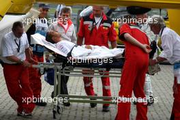 21.07.2007 Nürburg, Germany,  Lewis Hamilton (GBR), McLaren Mercedes is taken to a helicopter for health checks after crashing - Formula 1 World Championship, Rd 10, European Grand Prix, Saturday Qualifying