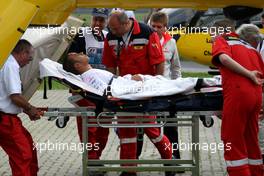 21.07.2007 Nürburg, Germany,  Lewis Hamilton (GBR), McLaren Mercedes is taken to a helicopter for health checks after crashing - Formula 1 World Championship, Rd 10, European Grand Prix, Saturday Qualifying