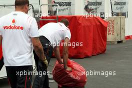 21.07.2007 Nürburg, Germany,  Front wheel of Lewis Hamilton (GBR), McLaren Mercedes get brought back to Bridgestone  - Formula 1 World Championship, Rd 10, European Grand Prix, Saturday Qualifying