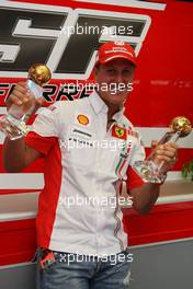 21.07.2007 Nürburg, Germany,  Michael Schumacher (GER, Scuderia Ferrari, Advisor) receives the Motorsport-Total.com awards from  Germany's largest motorsports portal for driver and team of the year 2006 and for his lifetime achievement.- Formula 1 World Championship, Rd 10, European Grand Prix, Saturday