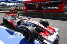 21.07.2007 Nürburg, Germany,  Lewis Hamilton (GBR), McLaren Mercedes, MP4-22 as Michael Schumacher (GER), Scuderia Ferrari, Advisor watches - Formula 1 World Championship, Rd 10, European Grand Prix, Saturday Practice