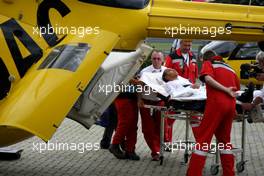 21.07.2007 Nürburg, Germany,  Lewis Hamilton (GBR), McLaren Mercedes is taken to a helicopter for health checks after crashing - Formula 1 World Championship, Rd 10, European Grand Prix, Saturday Qualifying