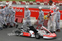 19.07.2007 Nürburg, Germany,  Lewis Hamilton (GBR), McLaren Mercedes, with young karters, Vodafone Karting Event - Formula 1 World Championship, Rd 10, European Grand Prix, Thursday