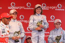 19.07.2007 Nürburg, Germany,  Lewis Hamilton (GBR), McLaren Mercedes, with young karters, Vodafone Karting Event - Formula 1 World Championship, Rd 10, European Grand Prix, Thursday