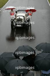 19.07.2007 Nürburg, Germany,  Fernando Alonso (ESP), McLaren Mercedes and Lewis Hamilton (GBR), McLaren Mercedes with a historic Mercedes S from 1927 - Formula 1 World Championship, Rd 10, European Grand Prix, Thursday