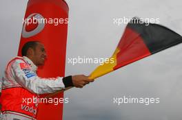 19.07.2007 Nürburg, Germany,  Lewis Hamilton (GBR), McLaren Mercedes, Waves the German national flag, Vodafone Karting Event - Formula 1 World Championship, Rd 10, European Grand Prix, Thursday