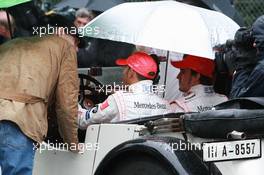 19.07.2007 Nürburg, Germany,  Fernando Alonso (ESP), McLaren Mercedes and Lewis Hamilton (GBR), McLaren Mercedes with a historic Mercedes S from 1927 - Formula 1 World Championship, Rd 10, European Grand Prix, Thursday