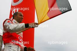 19.07.2007 Nürburg, Germany,  Lewis Hamilton (GBR), McLaren Mercedes, Waves the German national flag, Vodafone Karting Event - Formula 1 World Championship, Rd 10, European Grand Prix, Thursday