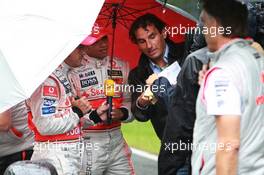 19.07.2007 Nürburg, Germany,  Fernando Alonso (ESP), McLaren Mercedes and Lewis Hamilton (GBR), McLaren Mercedes with a historic Mercedes S from 1927 - Formula 1 World Championship, Rd 10, European Grand Prix, Thursday