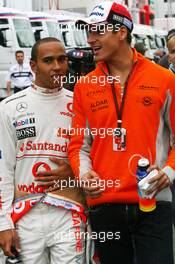 29.06.2007 Magny-Cours, France,  Lewis Hamilton (GBR), McLaren Mercedes, Adrian Sutil (GER), Spyker F1 Team - Formula 1 World Championship, Rd 8, French Grand Prix, Friday