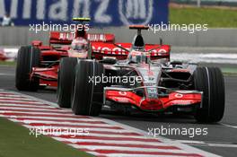 29.06.2007 Magny-Cours, France,  Fernando Alonso (ESP), McLaren Mercedes, MP4-22, Kimi Raikkonen (FIN), Räikkönen, Scuderia Ferrari, F2007 - Formula 1 World Championship, Rd 8, French Grand Prix, Friday Practice