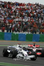 01.07.2007 Magny-Cours, France,  Nick Heidfeld (GER), BMW Sauber F1 Team , Fernando Alonso (ESP), McLaren Mercedes - Formula 1 World Championship, Rd 8, French Grand Prix, Sunday Race