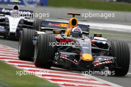 01.07.2007 Magny-Cours, France,  David Coulthard (GBR), Red Bull Racing, RB3, Alexander Wurz (AUT), Williams F1 Team, FW29 - Formula 1 World Championship, Rd 8, French Grand Prix, Sunday Race