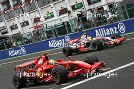 01.07.2007 Magny-Cours, France,  Race start, Felipe Massa (BRA), Scuderia Ferrari, Lewis Hamilton (GBR), McLaren Mercedes - Formula 1 World Championship, Rd 8, French Grand Prix, Sunday Race