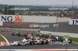 01.07.2007 Magny-Cours, France,  Race Start - Robert Kubica (POL),  BMW Sauber F1 Team - Giancarlo Fisichella (ITA), Renault F1 Team - Heikki Kovalainen (FIN), Renault F1 Team  - Formula 1 World Championship, Rd 8, French Grand Prix, Sunday Race