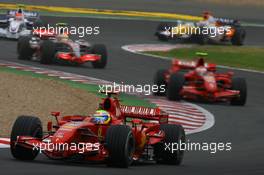 01.07.2007 Magny-Cours, France,  Start, Felipe Massa (BRA), Scuderia Ferrari, F2007, 2nd, Kimi Raikkonen (FIN), Räikkönen, Scuderia Ferrari, F2007, 3rd, Lewis Hamilton (GBR), McLaren Mercedes, MP4-22 - Formula 1 World Championship, Rd 8, French Grand Prix, Sunday Race