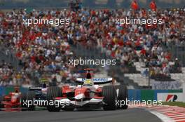 01.07.2007 Magny-Cours, France,  Ralf Schumacher (GER), Toyota Racing - Rubens Barrichello (BRA), Honda Racing F1 Team  - Formula 1 World Championship, Rd 8, French Grand Prix, Sunday Race