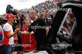 30.06.2007 Magny-Cours, France,  Michael Schumacher (GER), Scuderia Ferrari, Advisor and Zinedine Zidane (FRA) Famous Football Player - Formula 1 World Championship, Rd 8, French Grand Prix, Saturday