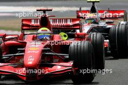 30.06.2007 Magny-Cours, France,  Felipe Massa (BRA), Scuderia Ferrari, F2007, Lewis Hamilton (GBR), McLaren Mercedes, MP4-22 - Formula 1 World Championship, Rd 8, French Grand Prix, Saturday Qualifying