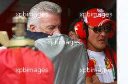 30.06.2007 Magny-Cours, France,  Michael Schumacher (GER), Scuderia Ferrari, Advisor, Willi Weber (GER), Driver Manager - Formula 1 World Championship, Rd 8, French Grand Prix, Saturday
