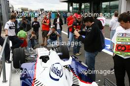 28.06.2007 Magny-Cours, France,  Fans in the pitlane with F1 Cars - Formula 1 World Championship, Rd 8, French Grand Prix, Thursday