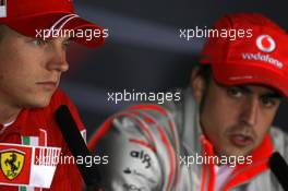 28.06.2007 Magny-Cours, France,  Kimi Raikkonen (FIN), Räikkönen, Scuderia Ferrari, Fernando Alonso (ESP), McLaren Mercedes - Formula 1 World Championship, Rd 8, French Grand Prix, Thursday Press Conference
