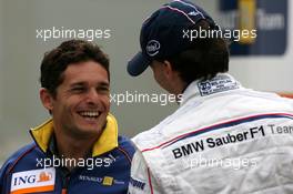 28.06.2007 Magny-Cours, France,  Giancarlo Fisichella (ITA), Renault F1 Team, Robert Kubica (POL),  BMW Sauber F1 Team - Formula 1 World Championship, Rd 8, French Grand Prix, Thursday