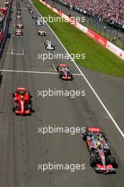 08.07.2007 Silverstone, England,  Start, Lewis Hamilton (GBR), McLaren Mercedes, MP4-22, Kimi Raikkonen (FIN), Räikkönen, Scuderia Ferrari, F2007, Fernando Alonso (ESP), McLaren Mercedes, MP4-22 - Formula 1 World Championship, Rd 9, British Grand Prix, Sunday Race