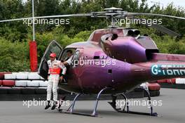 05.07.2007 Milton Keynes, England,  Lewis Hamilton (GBR) arrives in a helicopter, McLaren Mercedes with young British Katers, Daytona Kart Centre, Milton Keynes