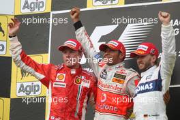 05.08.2007 Budapest, Hungary,  2nd place Kimi Raikkonen (FIN), Räikkönen, Scuderia Ferrari with 1st place Lewis Hamilton (GBR), McLaren Mercedes and 3rd place Nick Heidfeld (GER), BMW Sauber F1 Team - Formula 1 World Championship, Rd 11, Hungarian Grand Prix, Sunday Podium