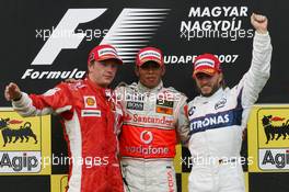 05.08.2007 Budapest, Hungary,  Winner, 1st, Lewis Hamilton (GBR), McLaren Mercedes, MP4-22, 2nd, Kimi Raikkonen (FIN), Räikkönen, Scuderia Ferrari, F2007, 3rd, Nick Heidfeld (GER), BMW Sauber F1 Team, F1.07 - Formula 1 World Championship, Rd 11, Hungarian Grand Prix, Sunday Podium