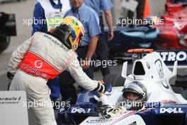 05.08.2007 Budapest, Hungary,  1st place Lewis Hamilton (GBR), McLaren Mercedes congratulates 3rd place Nick Heidfeld (GER), BMW Sauber F1 Team - Formula 1 World Championship, Rd 11, Hungarian Grand Prix, Sunday Podium