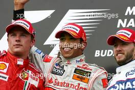 05.08.2007 Budapest, Hungary,  Kimi Raikkonen (FIN), Räikkönen, Scuderia Ferrari, Lewis Hamilton (GBR), McLaren Mercedes, Nick Heidfeld (GER), BMW Sauber F1 Team  - Formula 1 World Championship, Rd 11, Hungarian Grand Prix, Sunday Podium