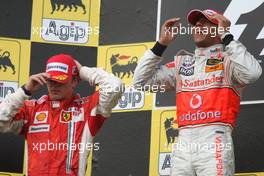 05.08.2007 Budapest, Hungary,  2nd place Kimi Raikkonen (FIN), Räikkönen, Scuderia Ferrari with 2nd place  Lewis Hamilton (GBR), McLaren Mercedes - Formula 1 World Championship, Rd 11, Hungarian Grand Prix, Sunday Podium