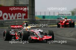 05.08.2007 Budapest, Hungary,  Lewis Hamilton (GBR), McLaren Mercedes, MP4-22 and Kimi Raikkonen (FIN), Räikkönen, Scuderia Ferrari, F2007 - Formula 1 World Championship, Rd 11, Hungarian Grand Prix, Sunday Race