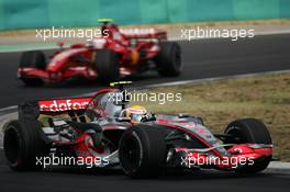 05.08.2007 Budapest, Hungary,  Lewis Hamilton (GBR), McLaren Mercedes, MP4-22 leads Kimi Raikkonen (FIN), Räikkönen, Scuderia Ferrari, F2007 - Formula 1 World Championship, Rd 11, Hungarian Grand Prix, Sunday Race