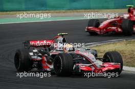 05.08.2007 Budapest, Hungary,  Lewis Hamilton (GBR), McLaren Mercedes, MP4-22 leads Kimi Raikkonen (FIN), Räikkönen, Scuderia Ferrari, F2007 - Formula 1 World Championship, Rd 11, Hungarian Grand Prix, Sunday Race